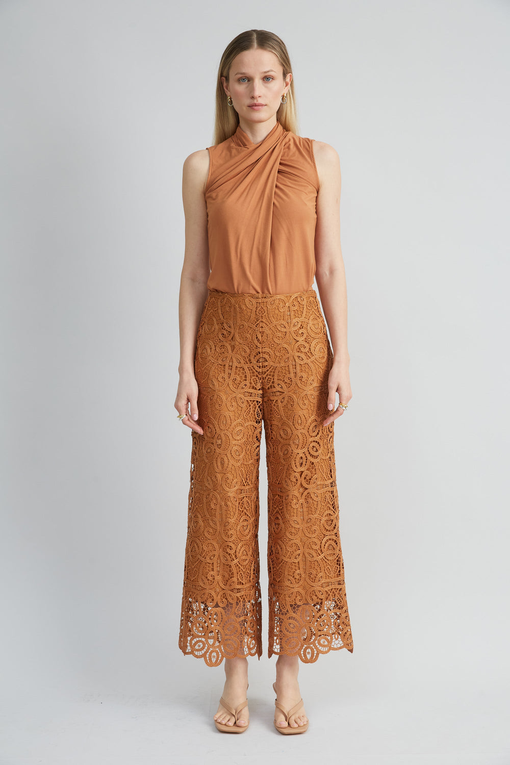Sleeveless Twist Neck Knit
